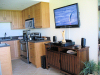 Kihei Surfside Unit 208 Kitchen and TV placement view