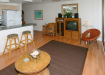 Kihei Surside unit 513 Kitchen and entertainment console view